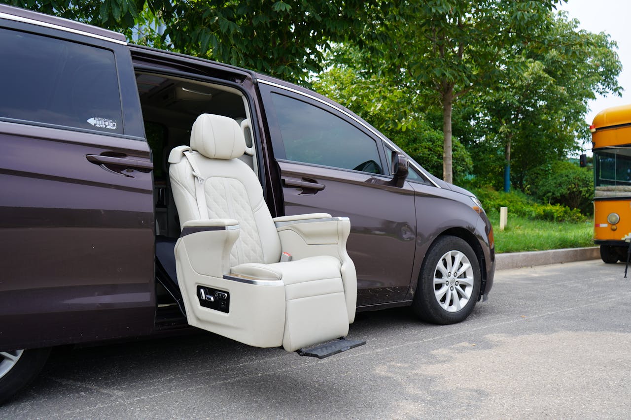 Innovative minivan seat design with automatic retractable function, ideal for accessibility.